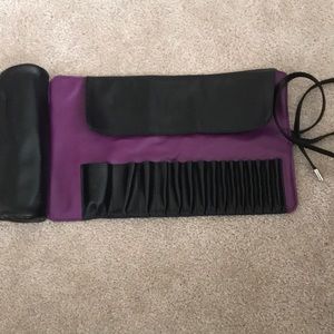 Brush roll makeup brush holder.